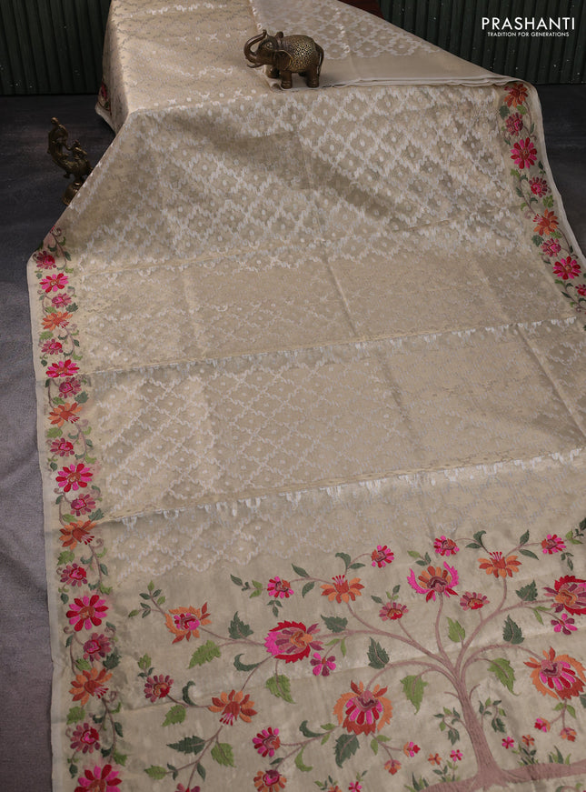 Tissue saree gold with allover zari woven brocade weaves and embroidery work border