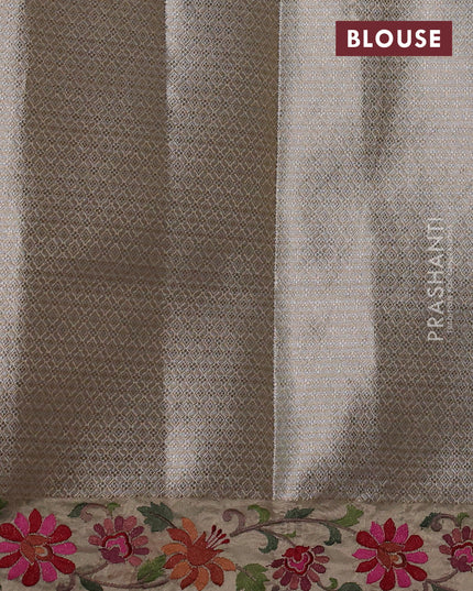 Tissue saree gold with allover zari woven brocade weaves and embroidery work border