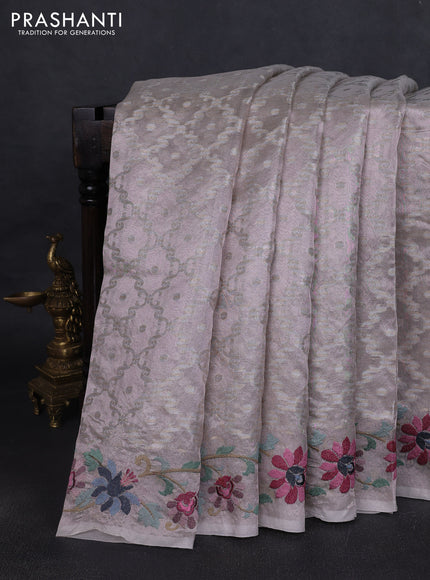 Tissue saree pastel pink shade with allover zari woven brocade weaves and embroidery work border