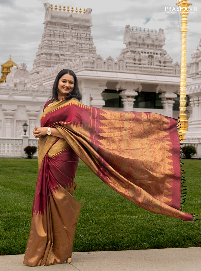 Pure kanchipuram silk saree maroon with plain body and rising temple border