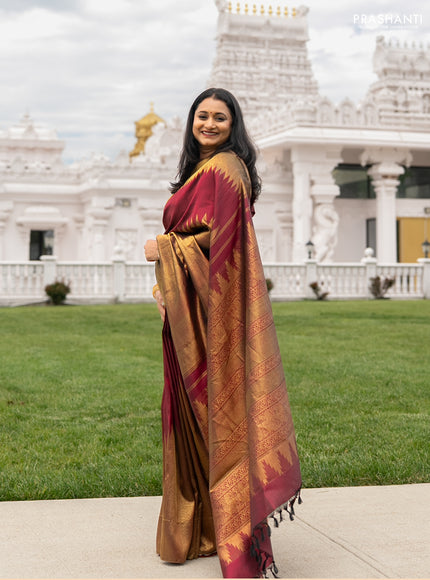 Pure kanchipuram silk saree maroon with plain body and rising temple border