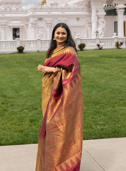 Pure kanchipuram silk saree maroon with plain body and rising temple border