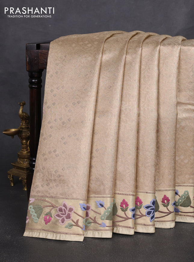 Tissue silk sare sandal and green brown with allover brocade weaves and embroidery work border