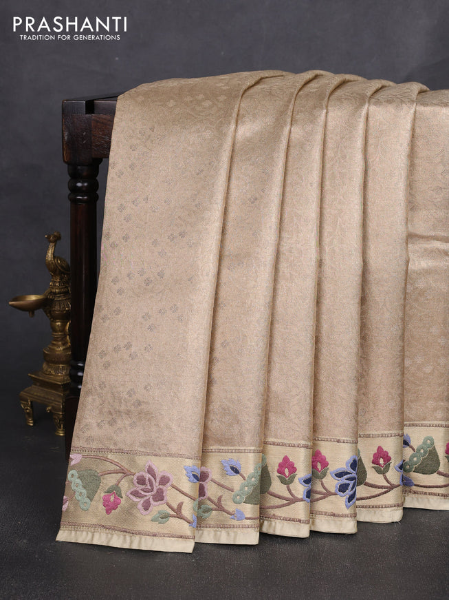 Tissue silk sare sandal and green brown with allover brocade weaves and embroidery work border