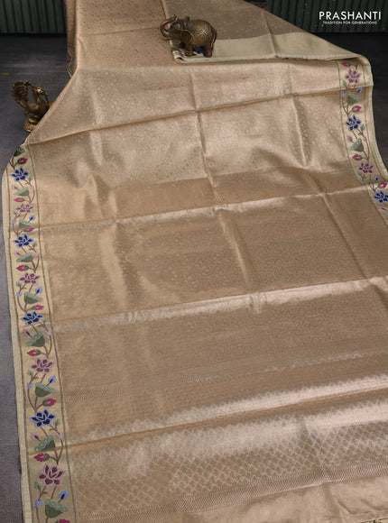 Tissue silk sare sandal and green brown with allover brocade weaves and embroidery work border