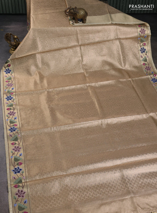 Tissue silk sare sandal and green brown with allover brocade weaves and embroidery work border