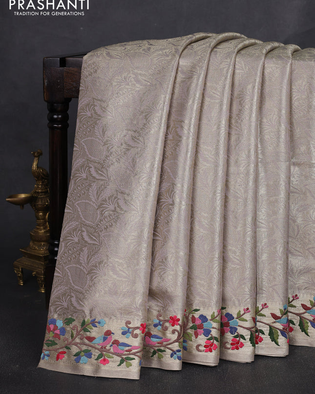 Tissue silk sare gold beige with allover brocade weaves and embroidery work border