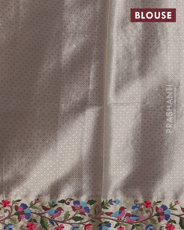 Tissue silk sare gold beige with allover brocade weaves and embroidery work border