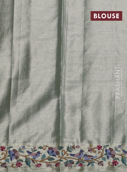 Tissue silk sare gold pastel green with allover brocade weaves and embroidery work border