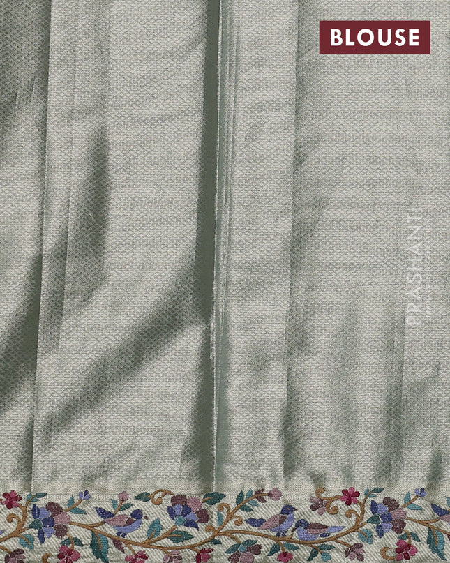Tissue silk sare gold pastel green with allover brocade weaves and embroidery work border