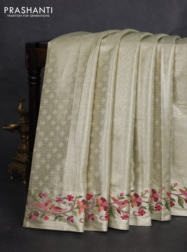 Tissue silk sare beige with allover brocade weaves and embroidery work border