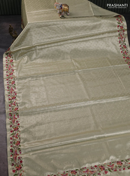 Tissue silk sare beige with allover brocade weaves and embroidery work border