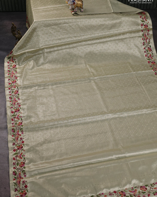 Tissue silk sare beige with allover brocade weaves and embroidery work border