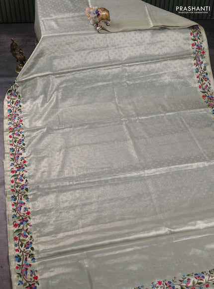 Tissue silk sare pastel grey with allover brocade weaves and embroidery work border