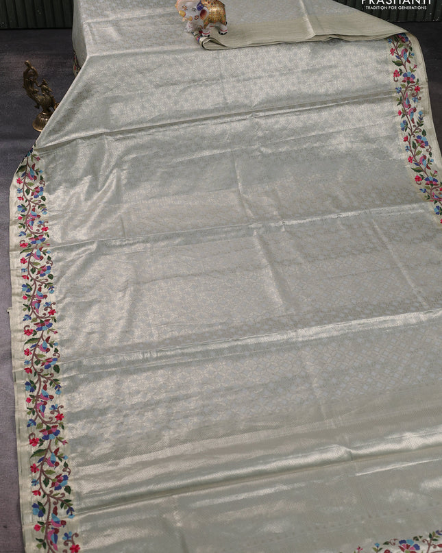 Tissue silk sare pastel grey with allover brocade weaves and embroidery work border