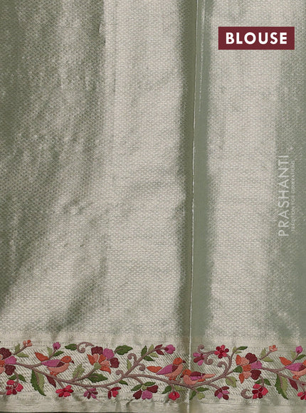 Tissue silk sare pastel green with allover brocade weaves and embroidery work border