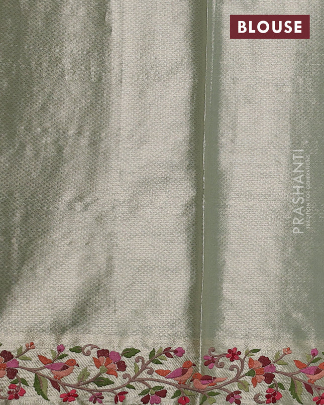 Tissue silk sare pastel green with allover brocade weaves and embroidery work border