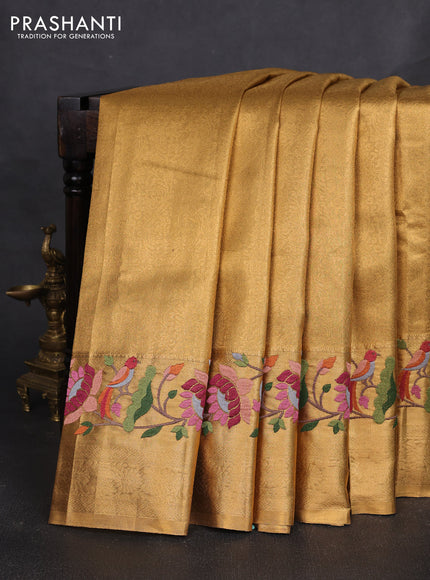 Tissue silk sare gold with allover brocade weaves and embroidery work border