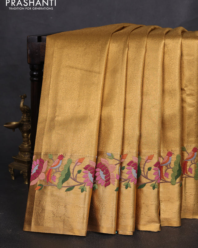 Tissue silk sare gold with allover brocade weaves and embroidery work border