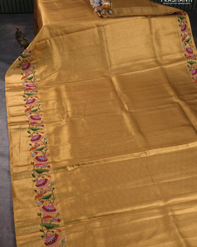 Tissue silk sare gold with allover brocade weaves and embroidery work border