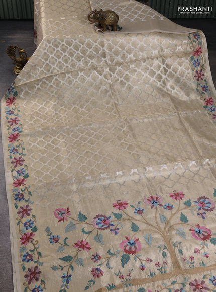 Tissue silk sare pastel grey with allover brocade weaves and embroidery work border