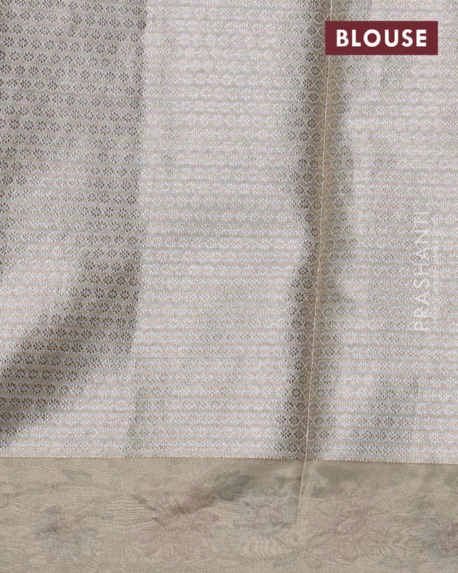 Tissue silk sare pastel grey with allover brocade weaves and embroidery work border