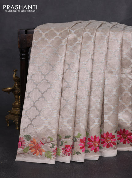 Tissue silk sare pastel pink with allover brocade weaves and embroidery work border