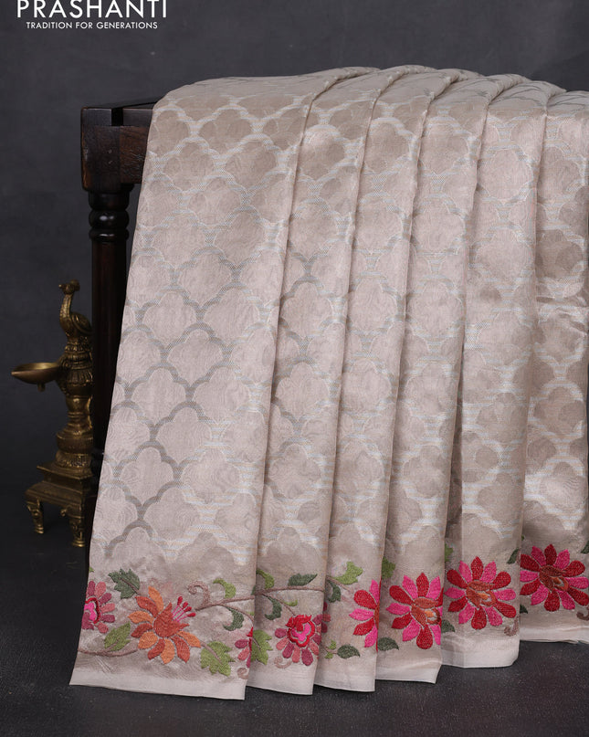 Tissue silk sare pastel pink with allover brocade weaves and embroidery work border