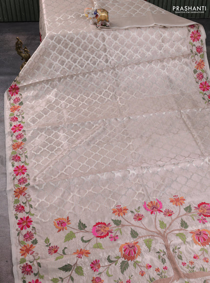Tissue silk sare pastel pink with allover brocade weaves and embroidery work border