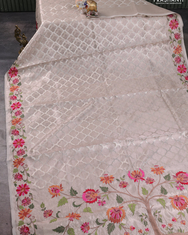 Tissue silk sare pastel pink with allover brocade weaves and embroidery work border