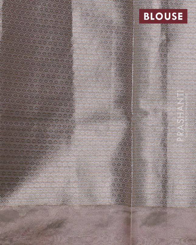 Tissue silk sare pastel pink with allover brocade weaves and embroidery work border