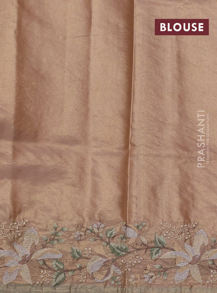 Tissue silk sare golden peach and pastel green with plain body and embroidery work border