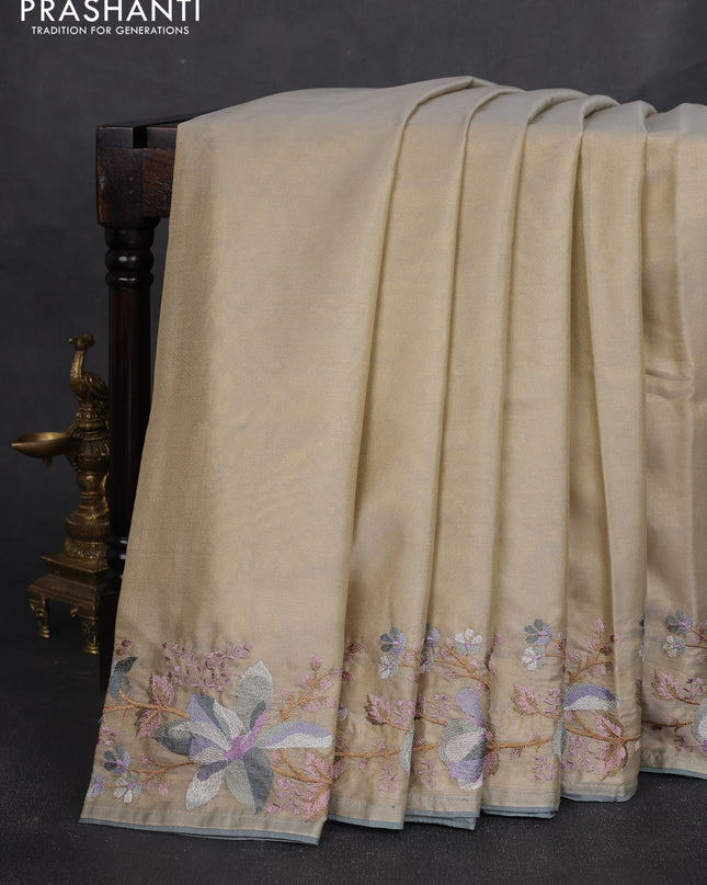 Tissue silk sare beige and grey with plain body and embroidery work border