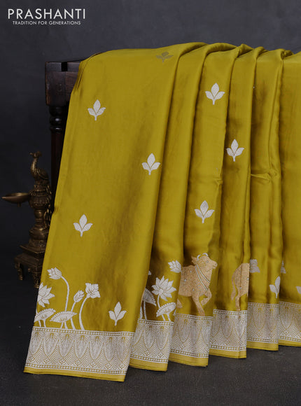 Art mushru silk saree mustard green with silver zari woven buttas and pichwai zari woven border