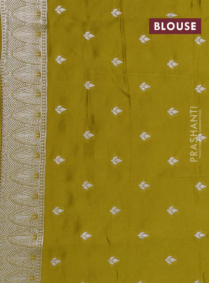 Art mushru silk saree mustard green with silver zari woven buttas and pichwai zari woven border