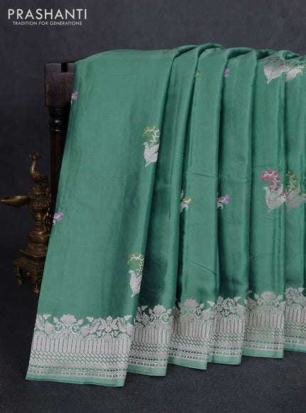 Art mushru silk saree teal green shade with zari woven buttas and zari woven border