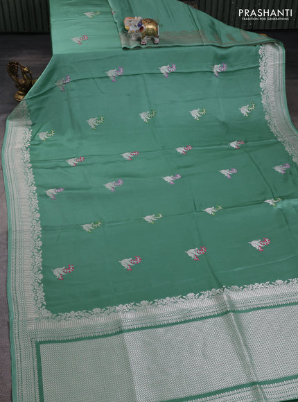 Art mushru silk saree teal green shade with zari woven buttas and zari woven border