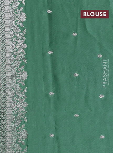 Art mushru silk saree teal green shade with zari woven buttas and zari woven border