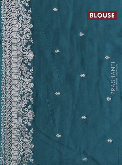 Art mushru silk saree teal blue shade with zari woven buttas and zari woven border