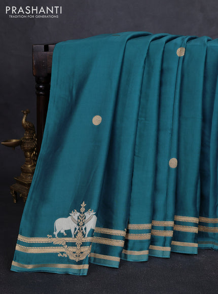 Art mushru silk saree peacock blue with zari woven coin buttas and zari woven border