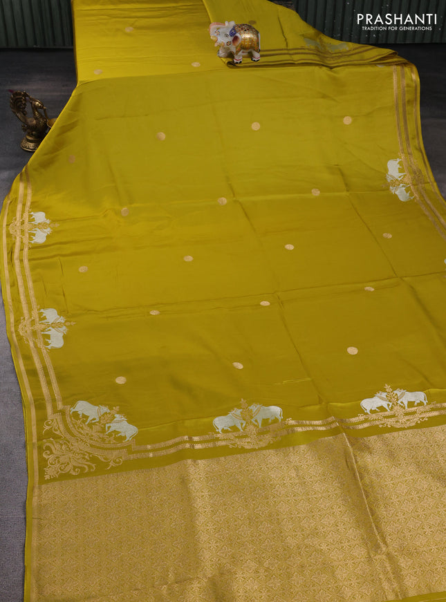 Art mushru silk saree mustard green with zari woven coin buttas and zari woven border