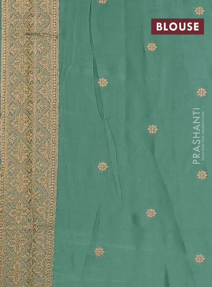 Art mushru silk saree pastel green with zari woven coin buttas and zari woven border