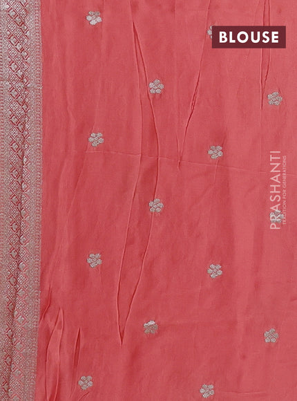 Art mushru silk saree peach shade with zari woven buttas and long zari woven border