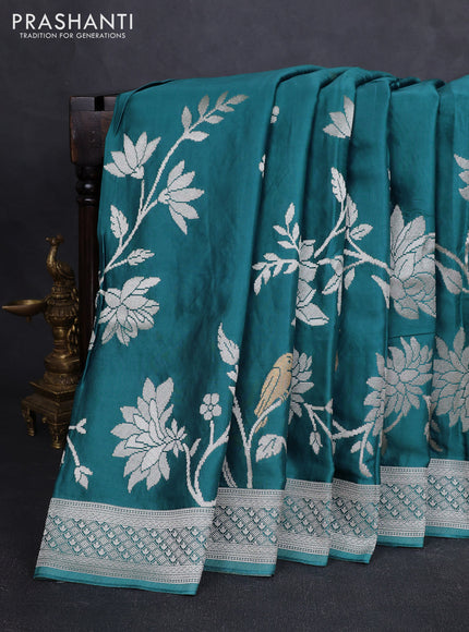 Art mushru silk saree teal blue shade with zari woven buttas and long zari woven border