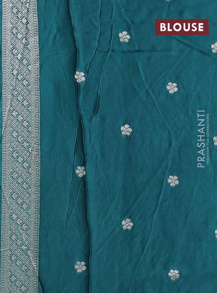Art mushru silk saree teal blue shade with zari woven buttas and long zari woven border