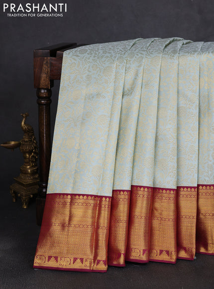 Pure kanchipuram silk saree pastel blue and wine shade with allover zari woven brocade weaves and rich zari woven border
