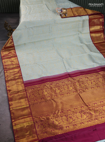 Pure kanchipuram silk saree pastel blue and wine shade with allover zari woven brocade weaves and rich zari woven border