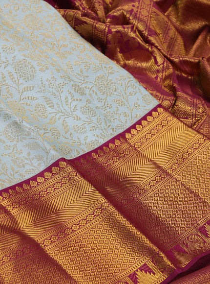 Pure kanchipuram silk saree pastel blue and wine shade with allover zari woven brocade weaves and rich zari woven border