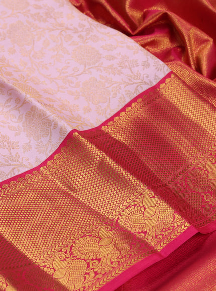 Pure kanchipuram silk saree mild peach pink and pink with allover zari woven brocade weaves and long rich zari woven border