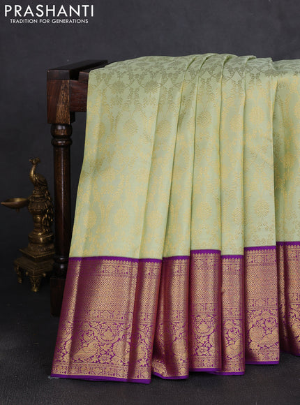 Pure kanchipuram silk saree pista green and violet with allover zari woven brocade weaves and long rich zari woven border